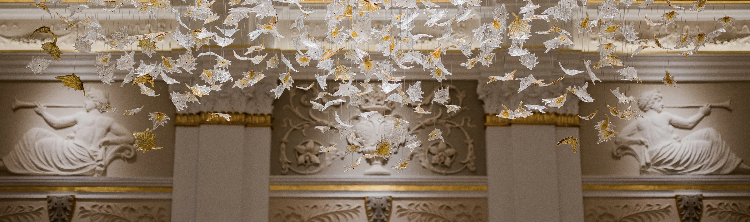 Glass installation and sculptural figures in the historic Old Casino
